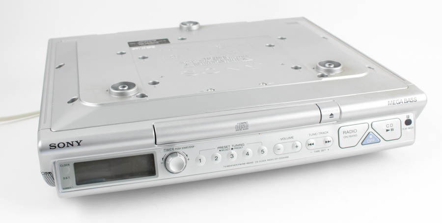 Sony Mega Bass Radio/CD Player and Assortment of CDs