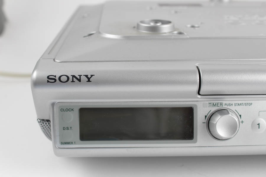Sony Mega Bass Radio/CD Player and Assortment of CDs
