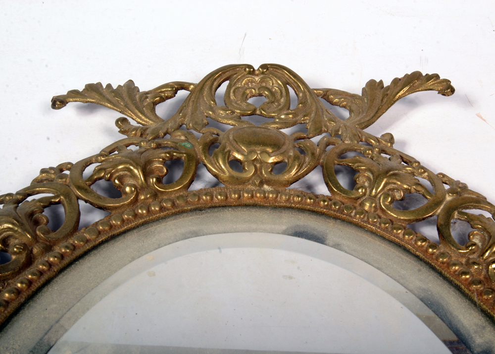 Beveled Glass Oval Mirror in Brass Frame