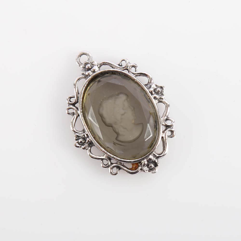 Silver Tone Whiting and Davis Glass Cameo Pendant
