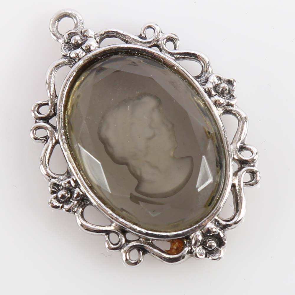 Silver Tone Whiting and Davis Glass Cameo Pendant