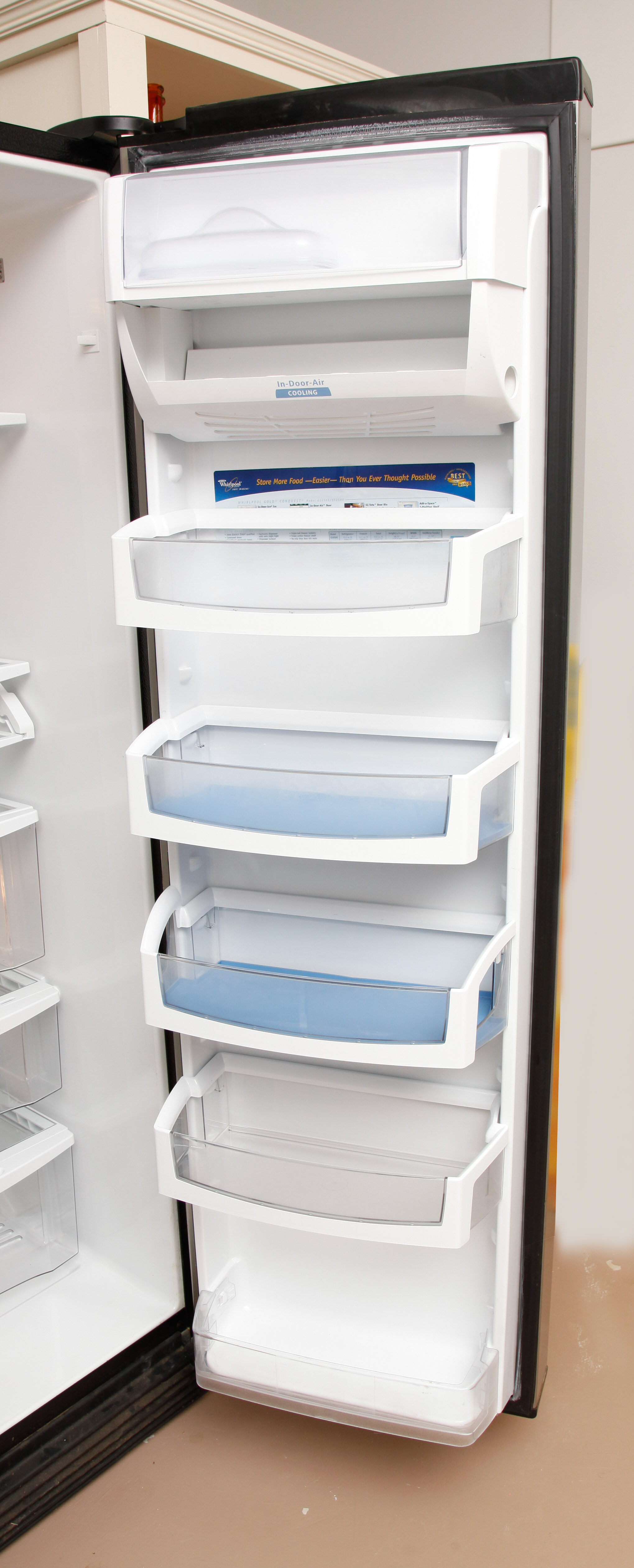 Silver "Whirlpool Gold" Refrigerator with Conquest Ice Filter