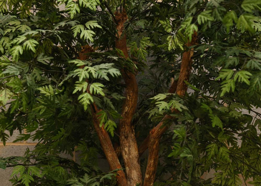 A Chinese Pidan Egg Pot and Artificial Tree