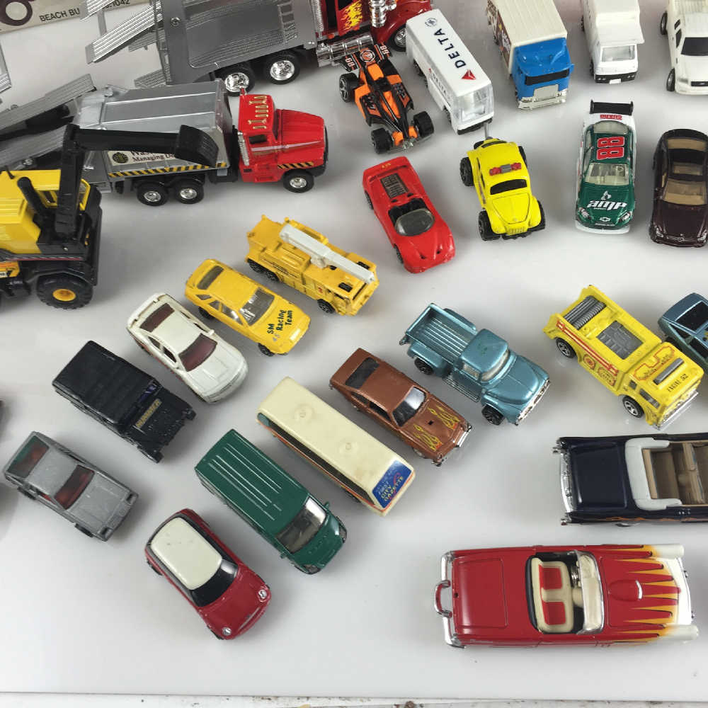 Vintage Diecast Cars With Newer Trucks, Cars, and Racers