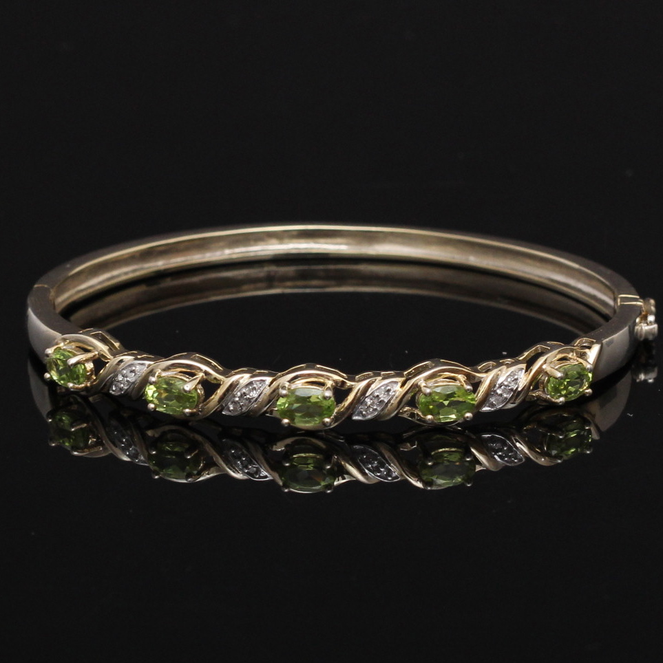 Pair of Sterling, Diamond, and Gemstone Bracelets