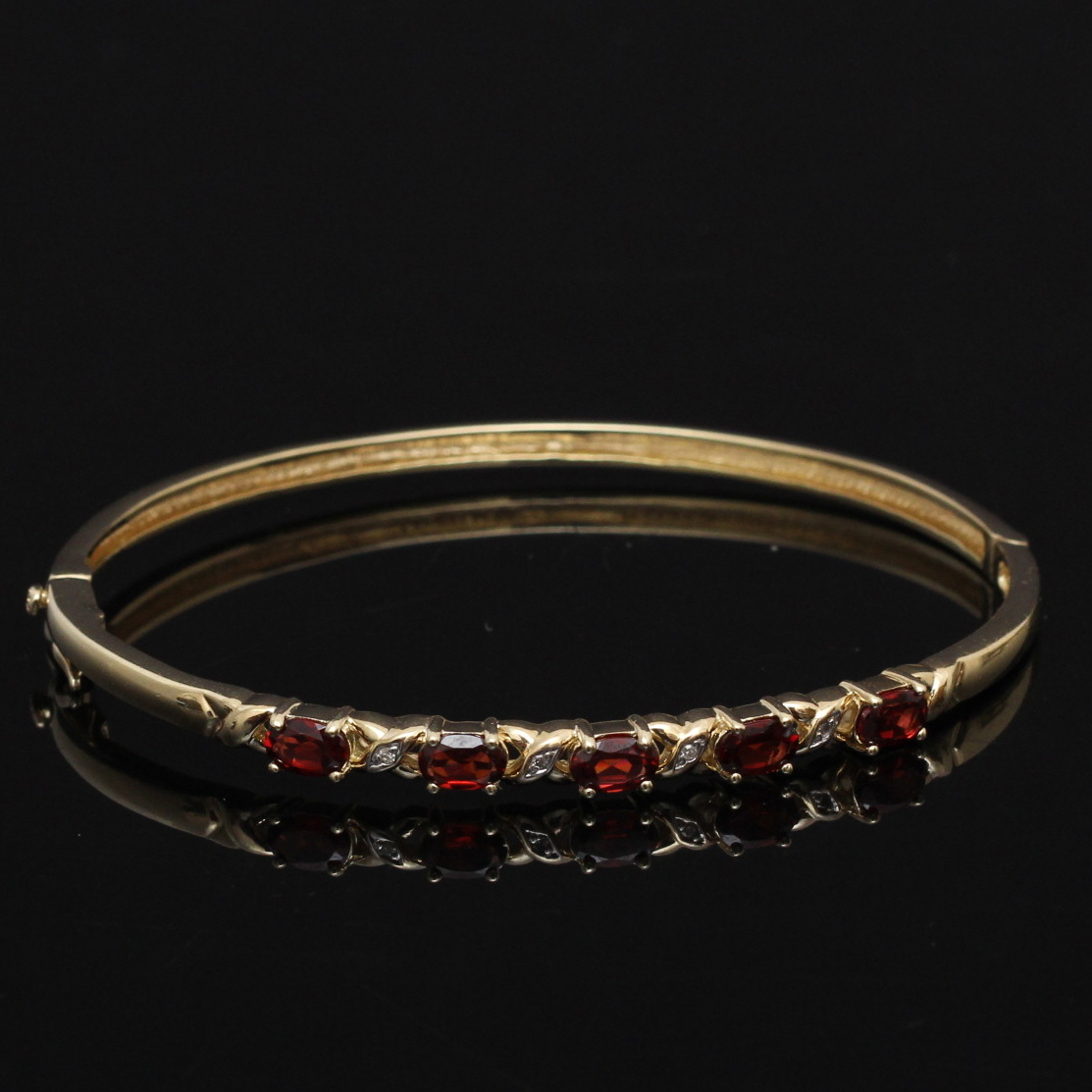 Pair of Sterling, Diamond, and Gemstone Bracelets