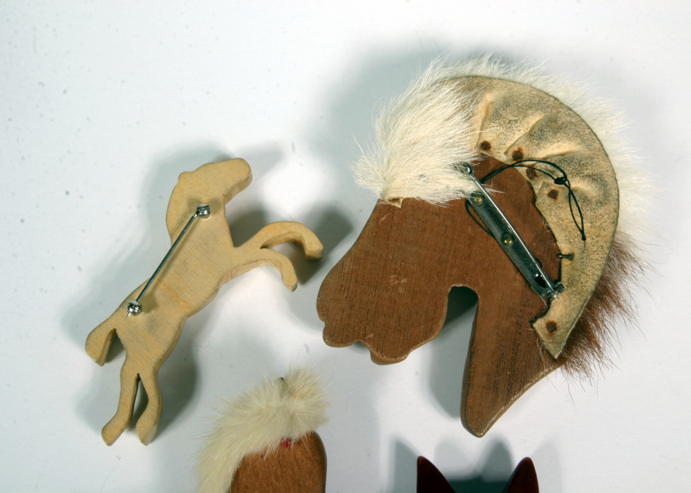 Collection of Bakelite and Carved Wood Horse Brooches