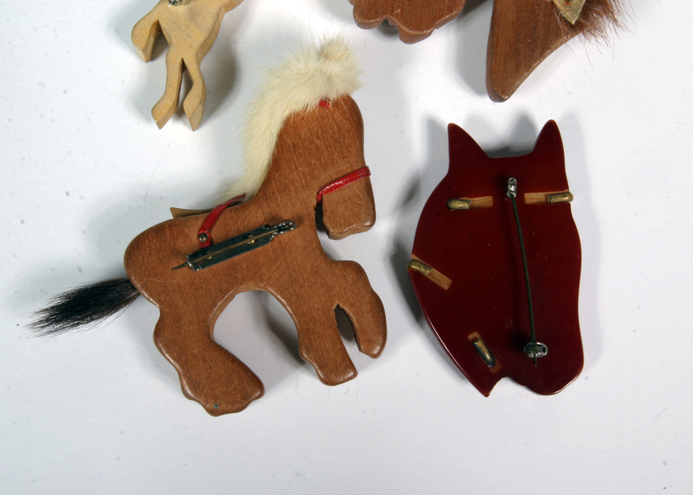Collection of Bakelite and Carved Wood Horse Brooches
