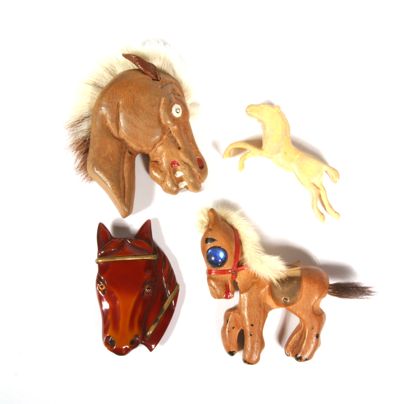 Collection of Bakelite and Carved Wood Horse Brooches