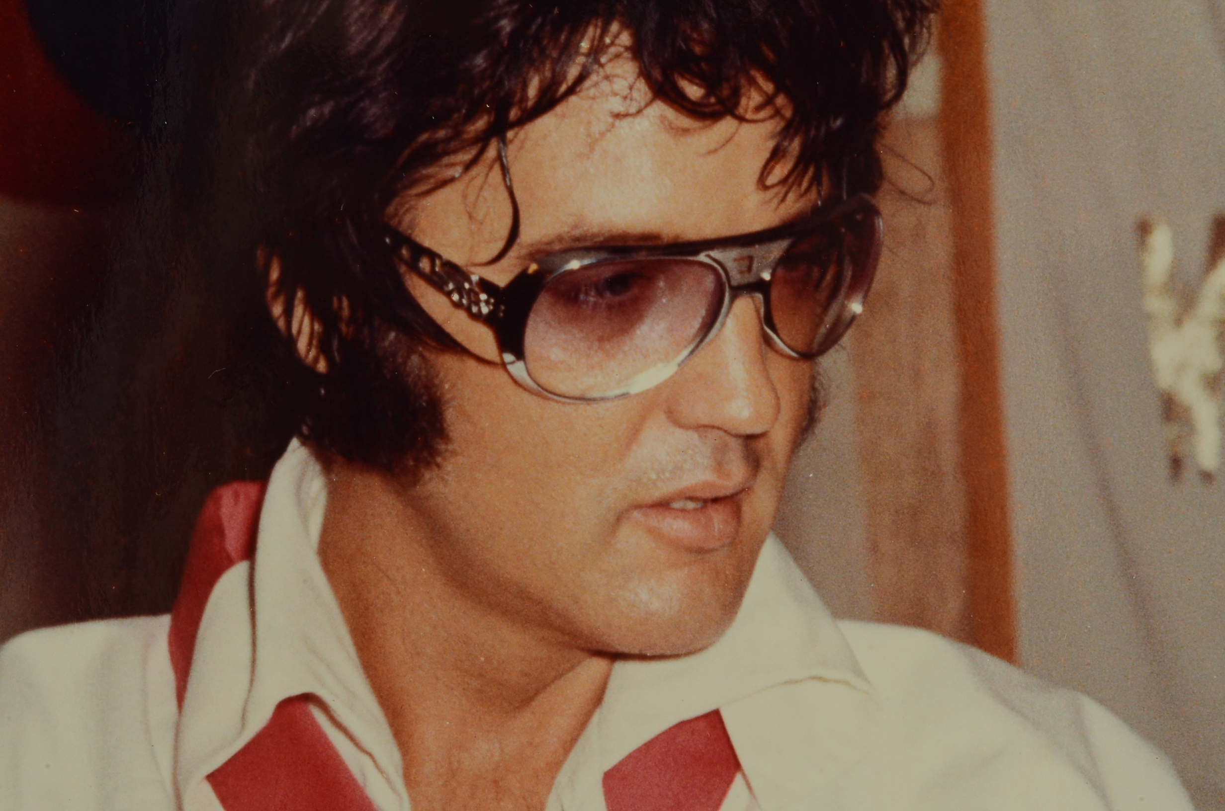 1970s Vintage Color Photograph of Elvis Presley Wearing Sunglasses and His Custom Made Martial Arts Gi Jumpsuit for a Film Shoot