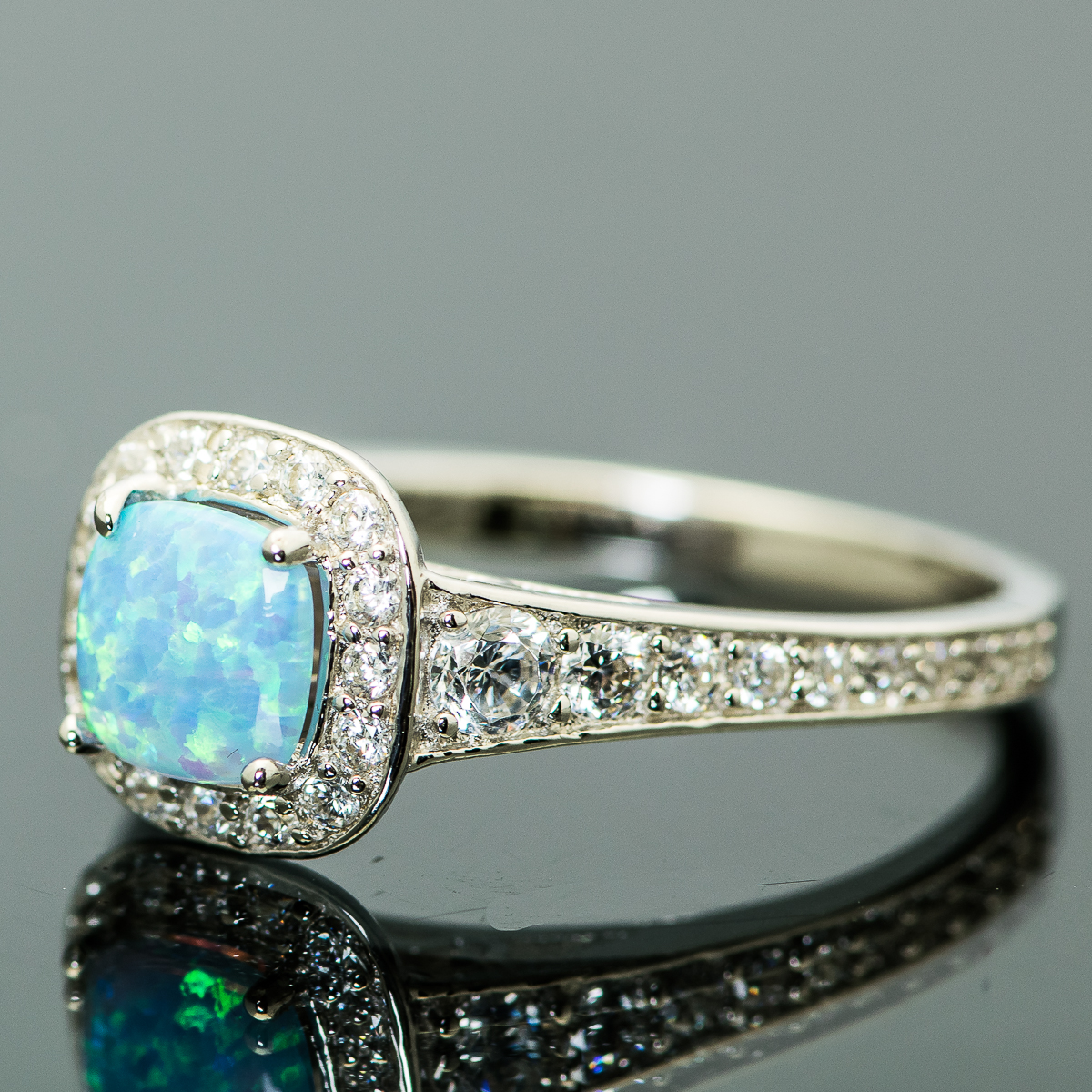 Sterling Silver and Synthetic Blue Opal Halo Ring