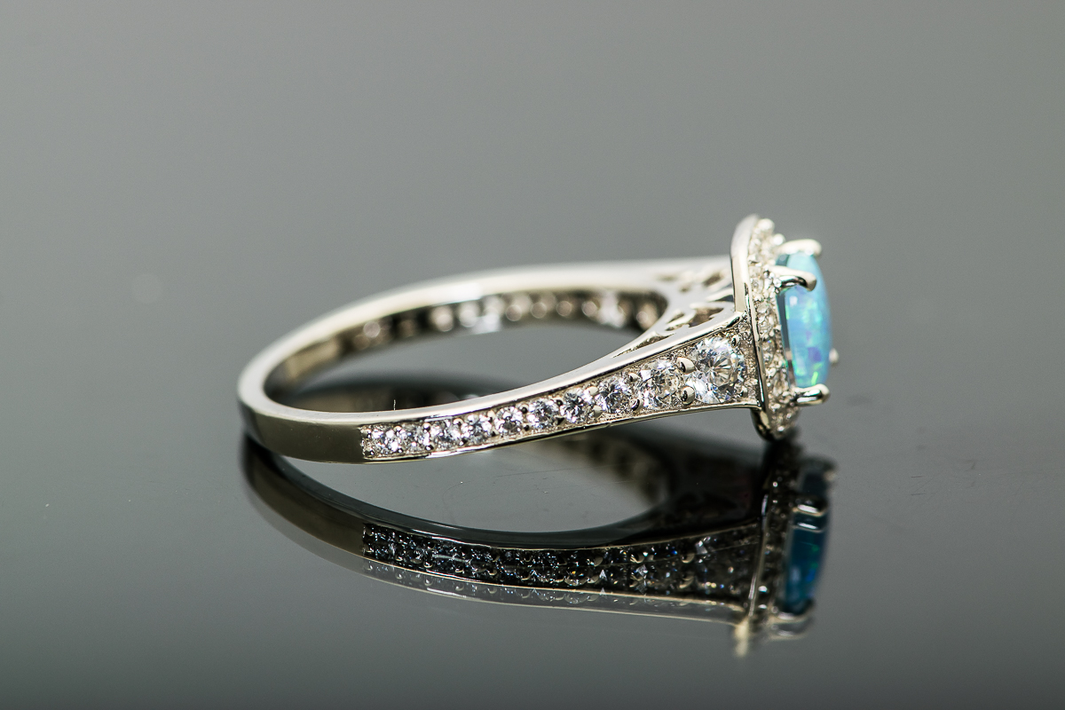 Sterling Silver and Synthetic Blue Opal Halo Ring