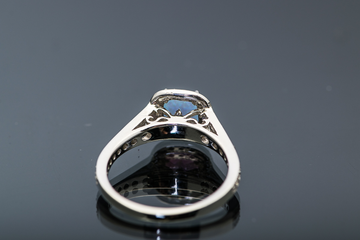 Sterling Silver and Synthetic Blue Opal Halo Ring