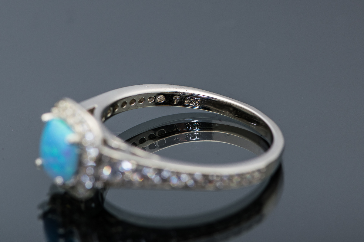 Sterling Silver and Synthetic Blue Opal Halo Ring