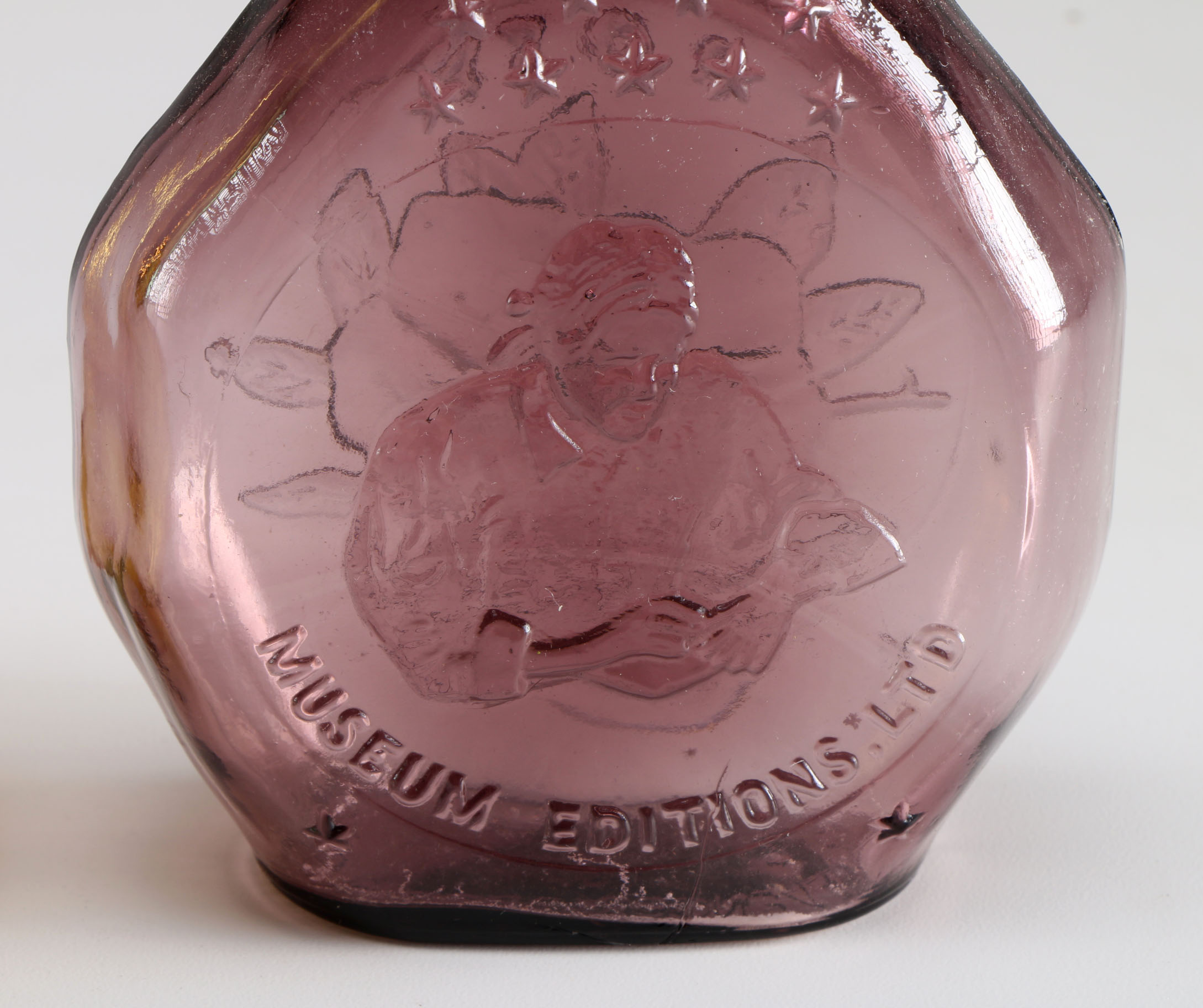 Assortment of Clevenger Brothers Colored Glass Bottles