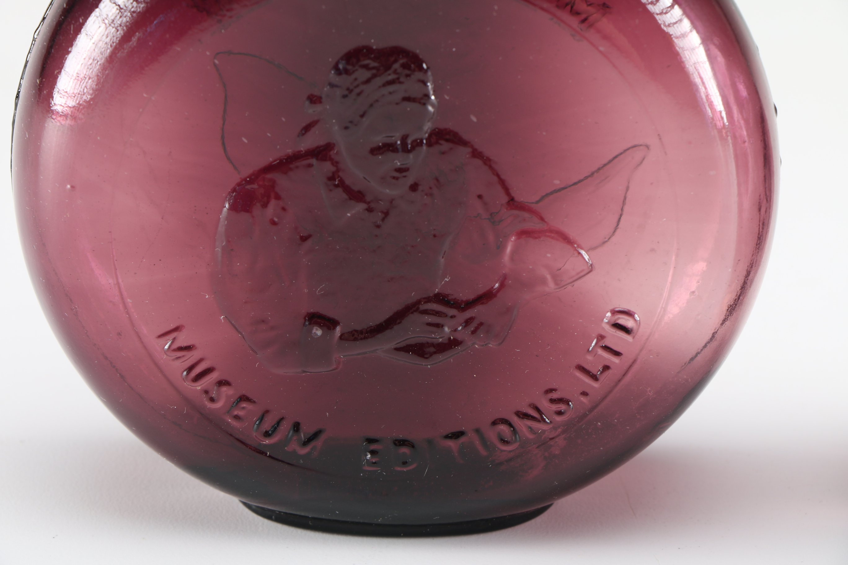 Assortment of Clevenger Brothers Colored Glass Bottles