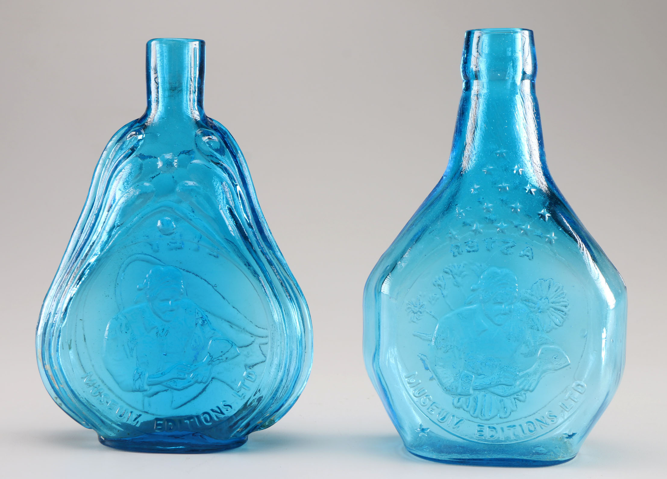 Assortment of Clevenger Brothers Colored Glass Bottles