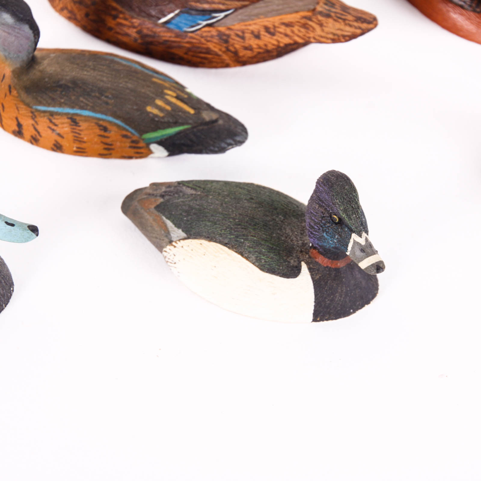 Fifteen Hand-Painted Miniature Ducks by William J. Koelpin