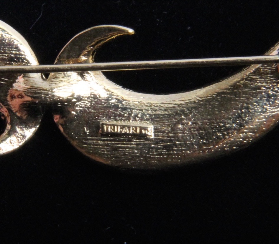 Trifari Black and Gold Tone Panther and Crescent Costume Brooches