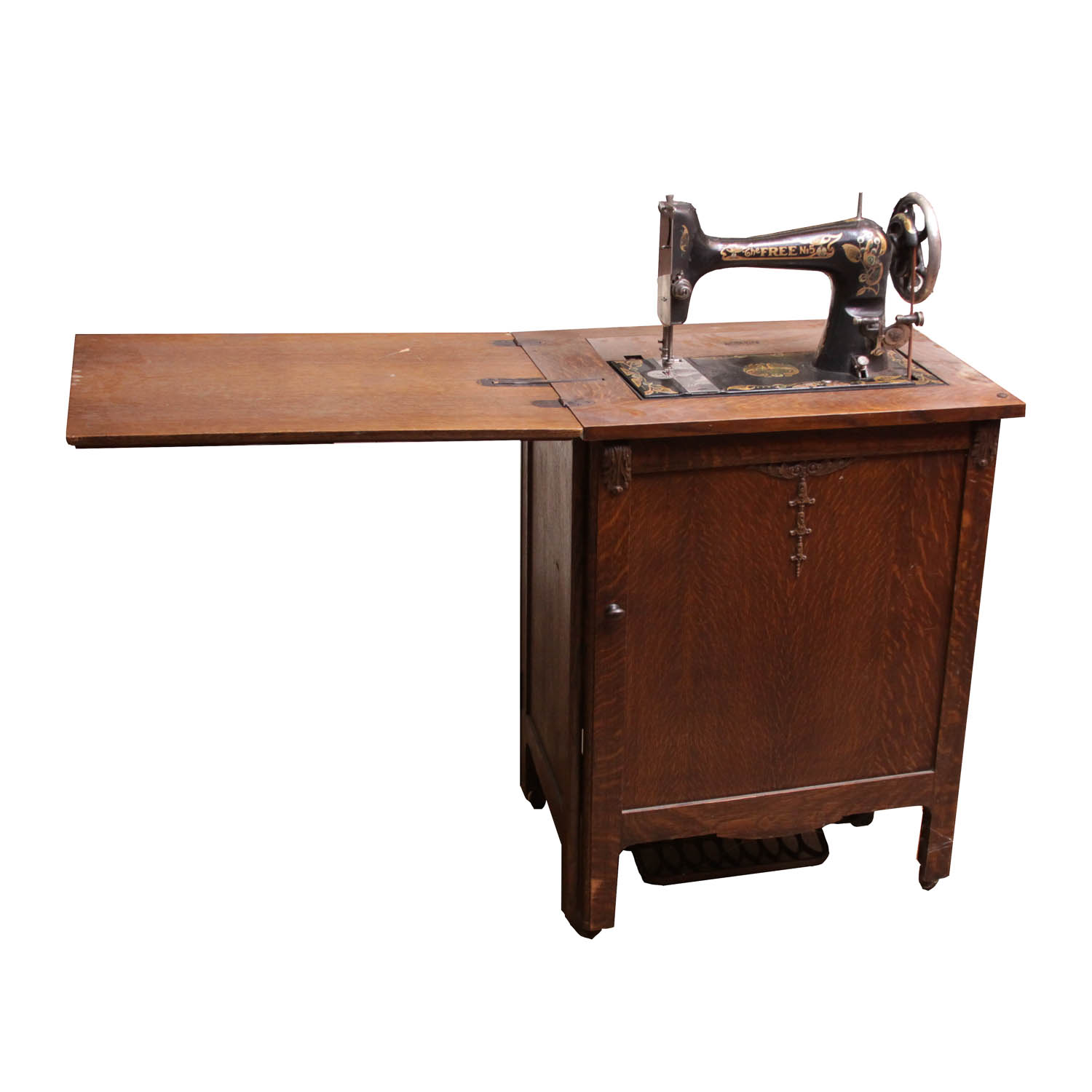 Antique Sewing Machine in Oak Cabinet by Free Co.