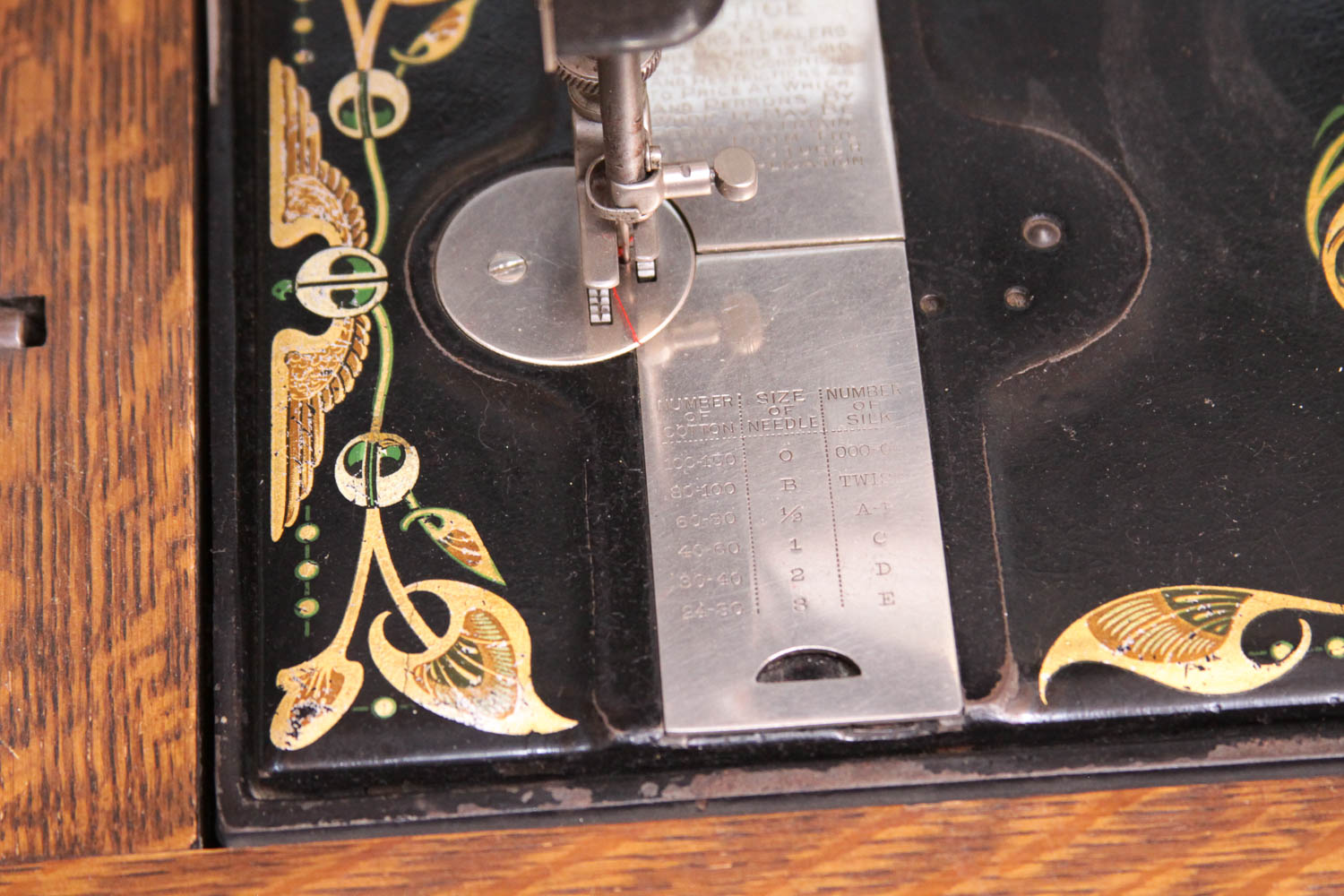 Antique Sewing Machine in Oak Cabinet by Free Co.