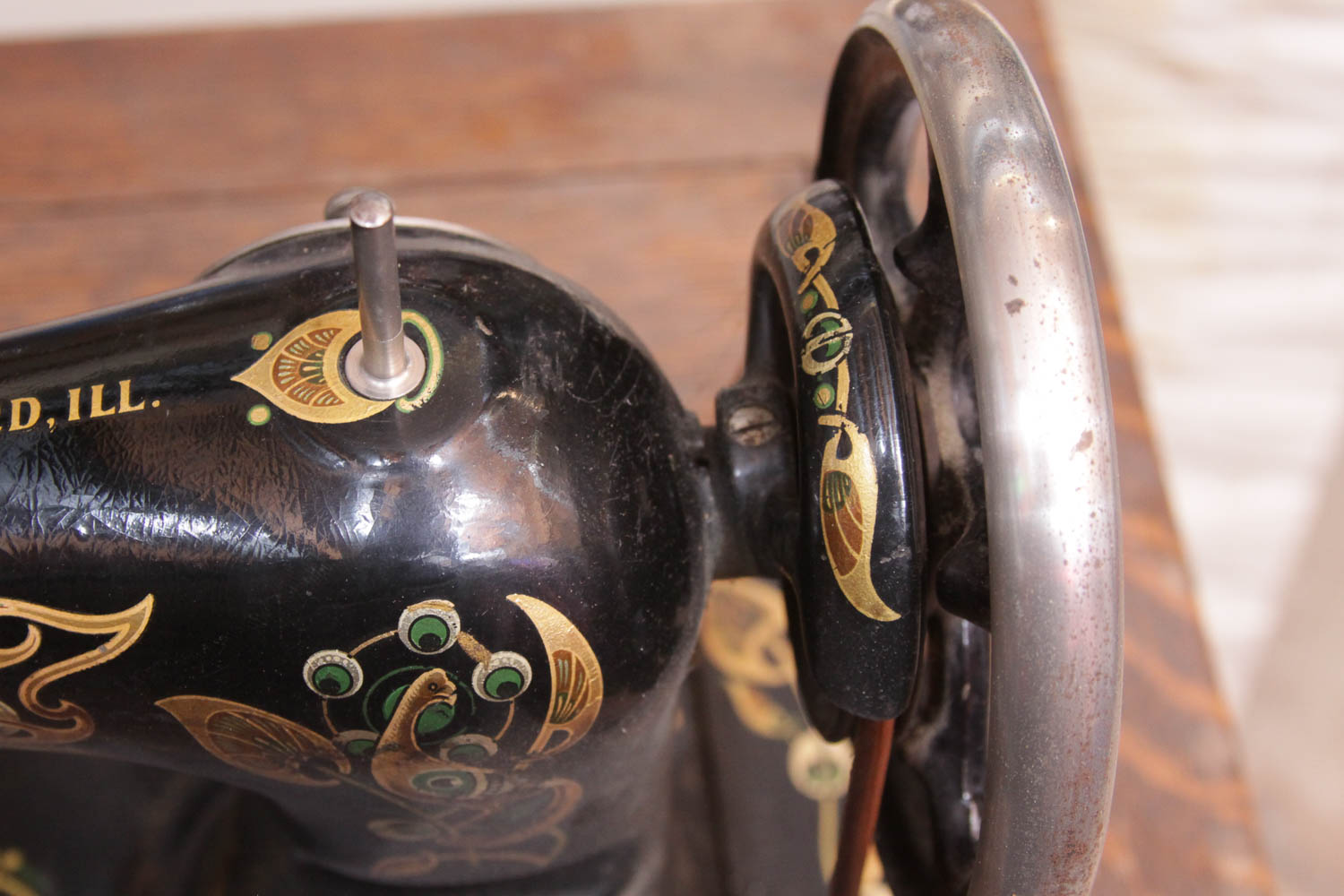 Antique Sewing Machine in Oak Cabinet by Free Co.