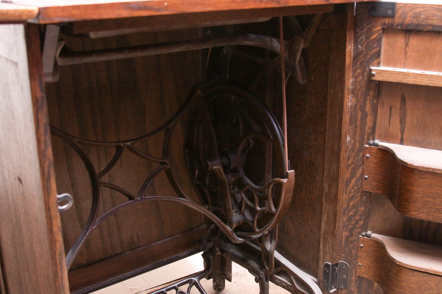 Antique Sewing Machine in Oak Cabinet by Free Co.