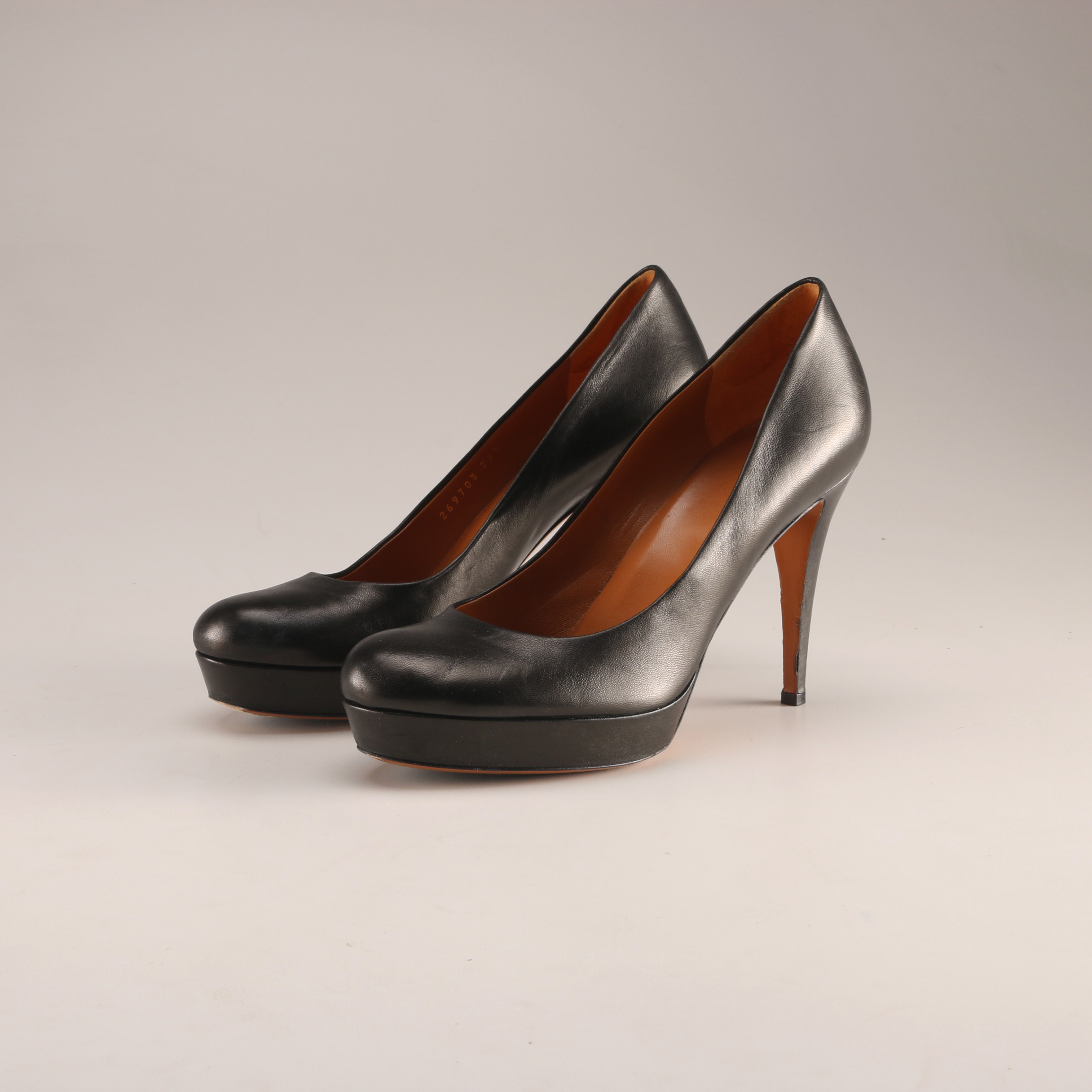 Pair of Black Gucci Heels, Size 8.5