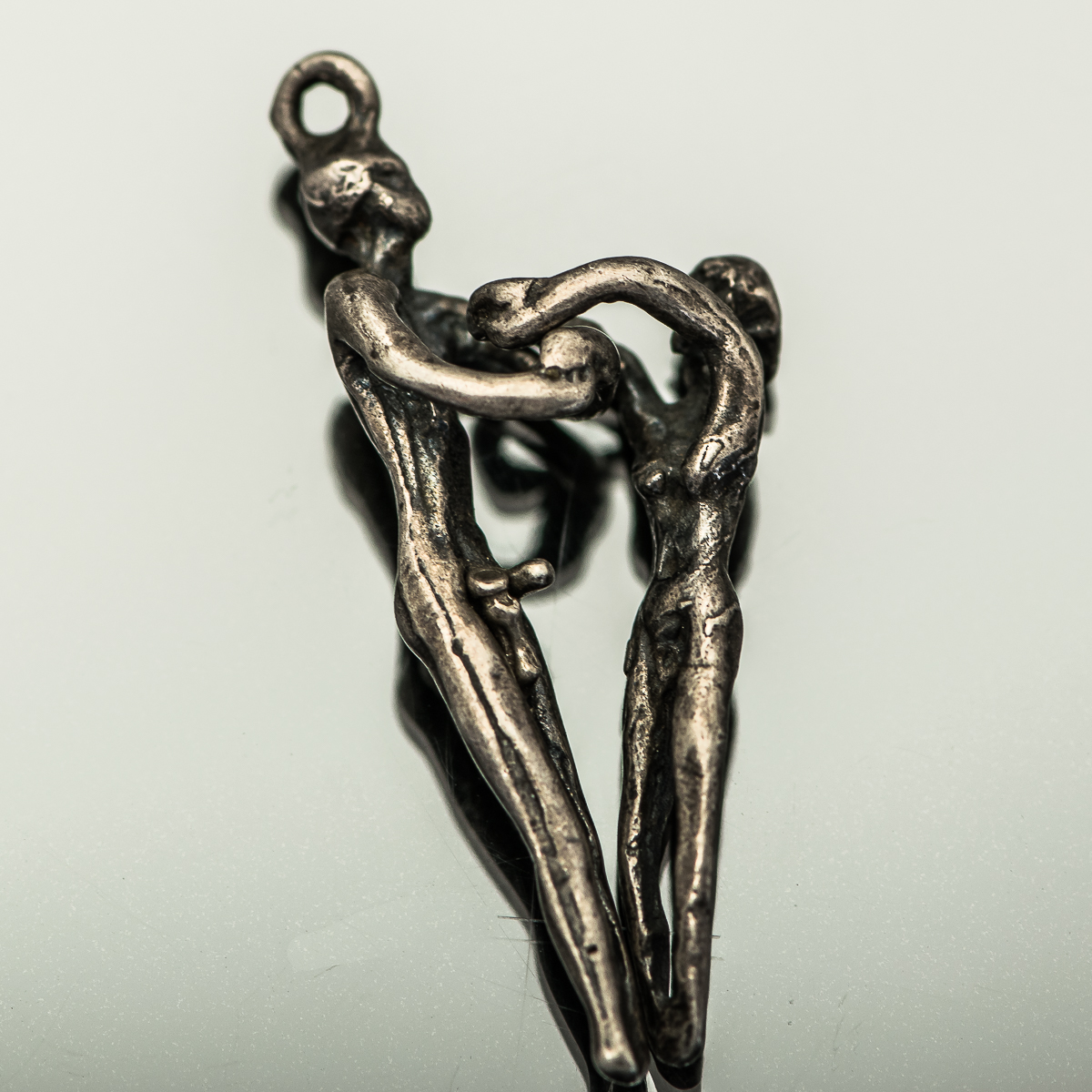 Pair of Sterling Silver Human Form Pendants