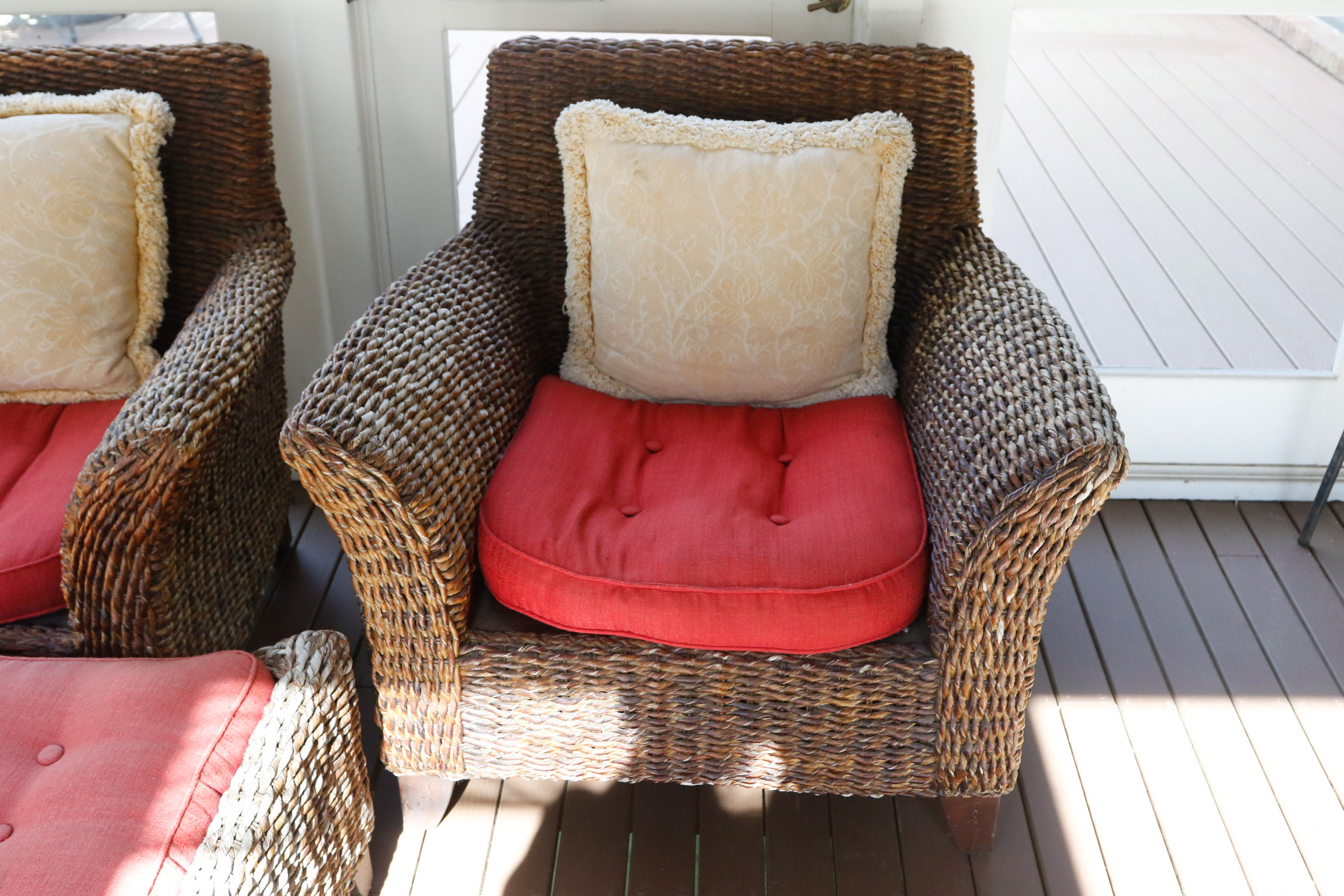 Pair of Wicker Club Chairs and Matching Ottoman