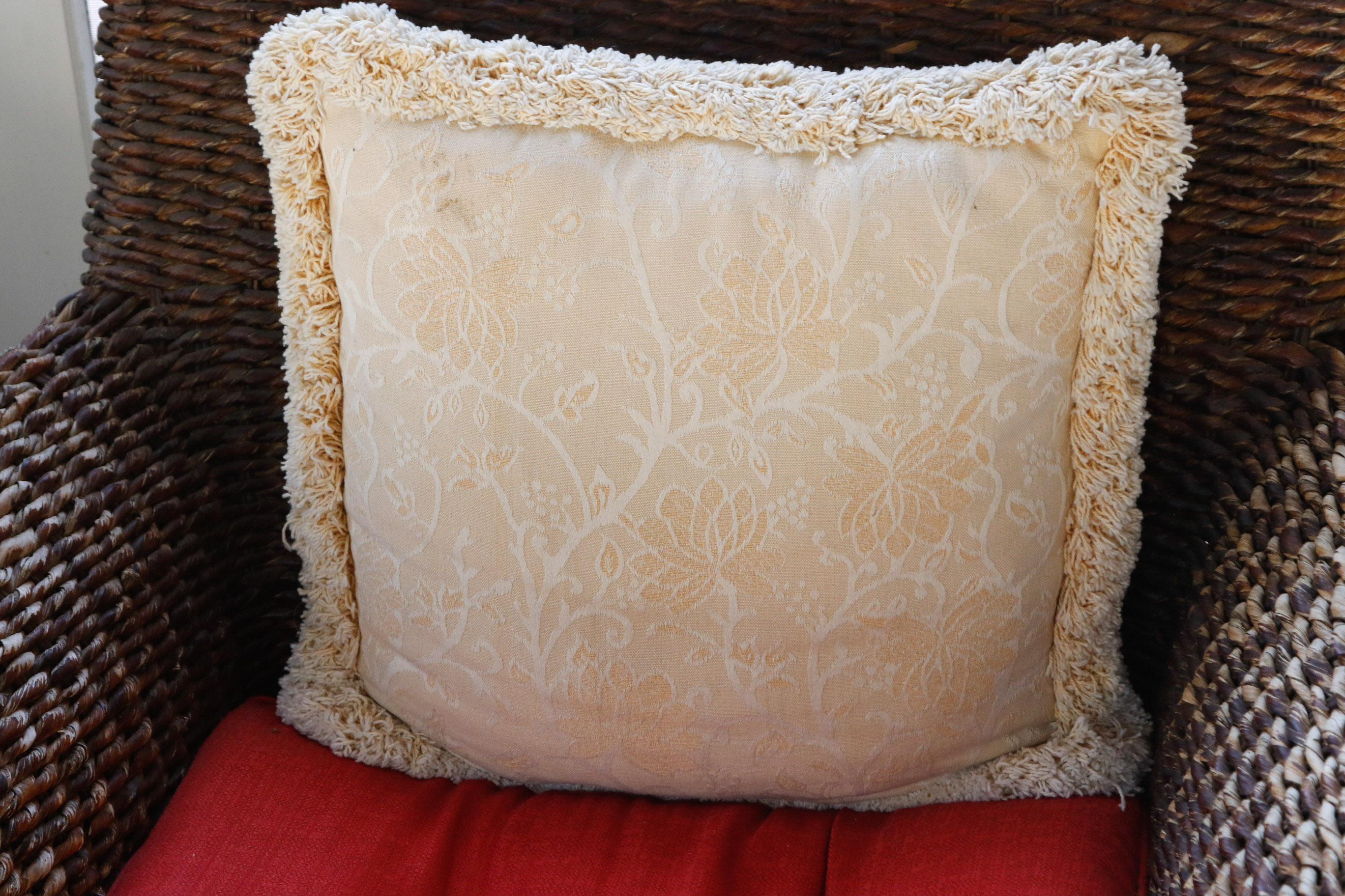 Pair of Wicker Club Chairs and Matching Ottoman