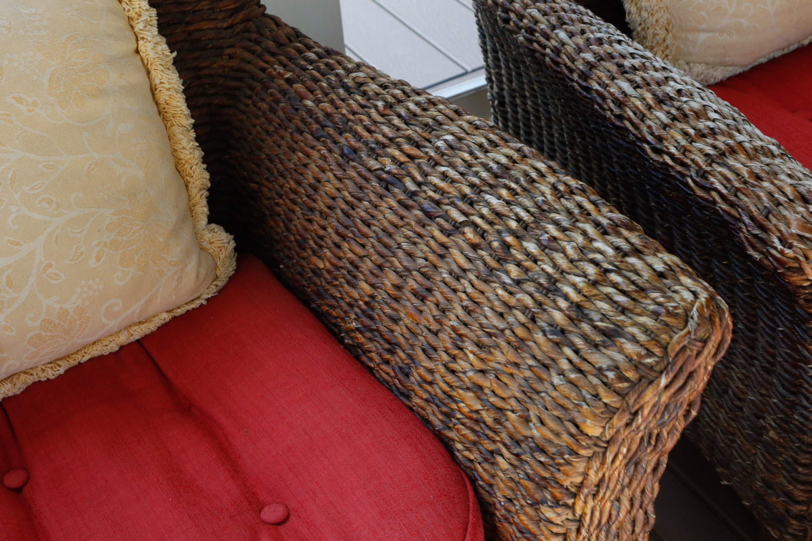 Pair of Wicker Club Chairs and Matching Ottoman