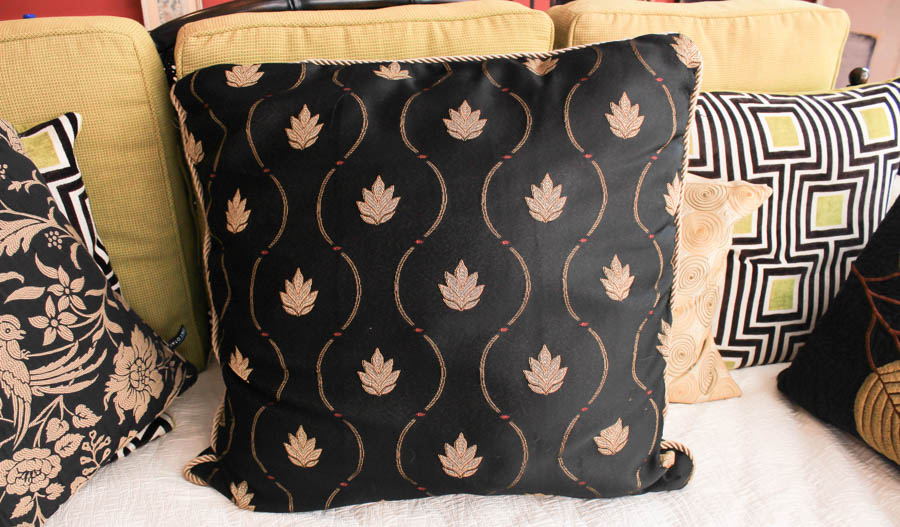 Rattan and Bamboo Day Bed With Decorative Throw Pillows