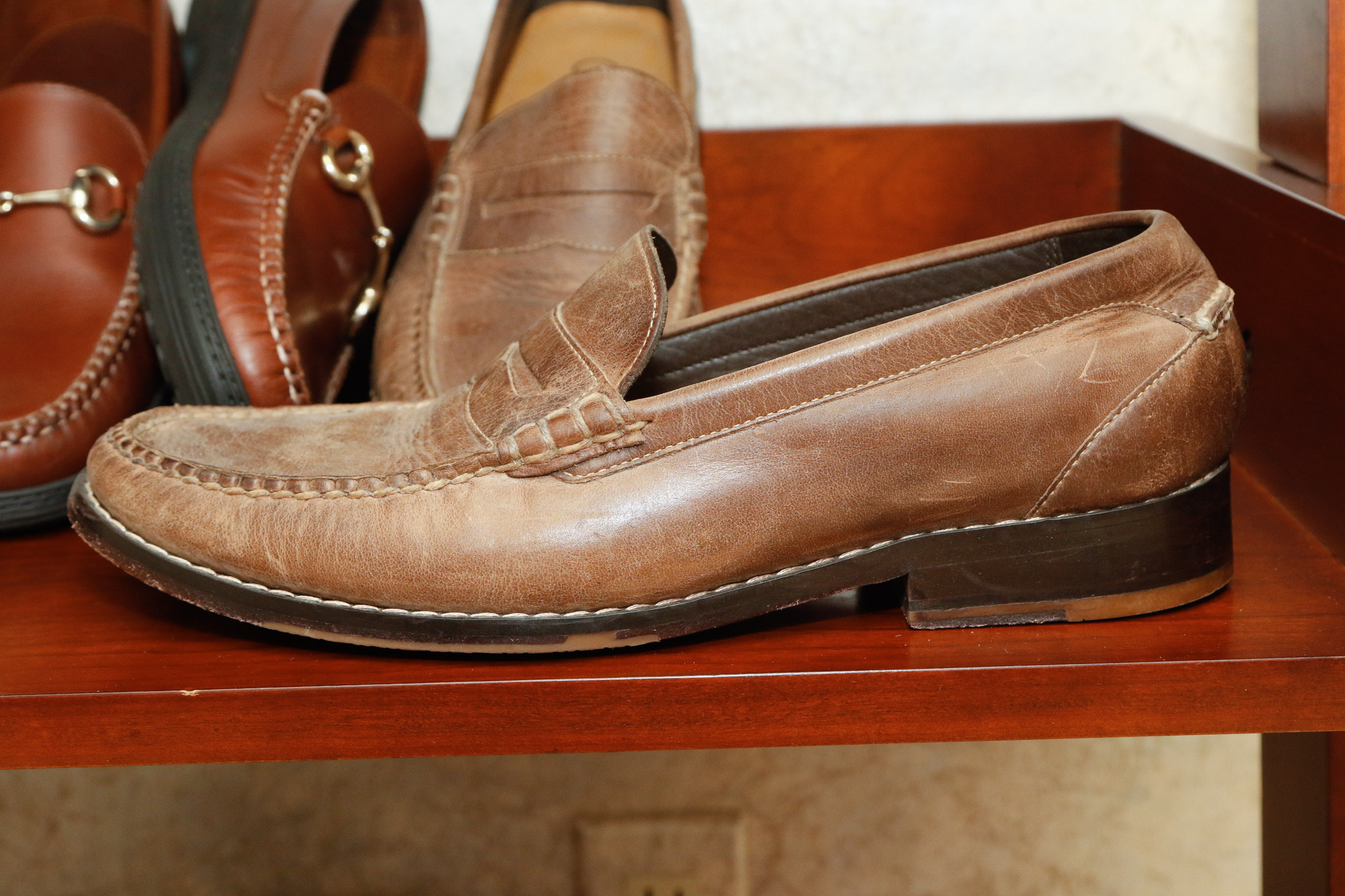 Four Pairs of Men's Loafers Including Coach and Cole Haan