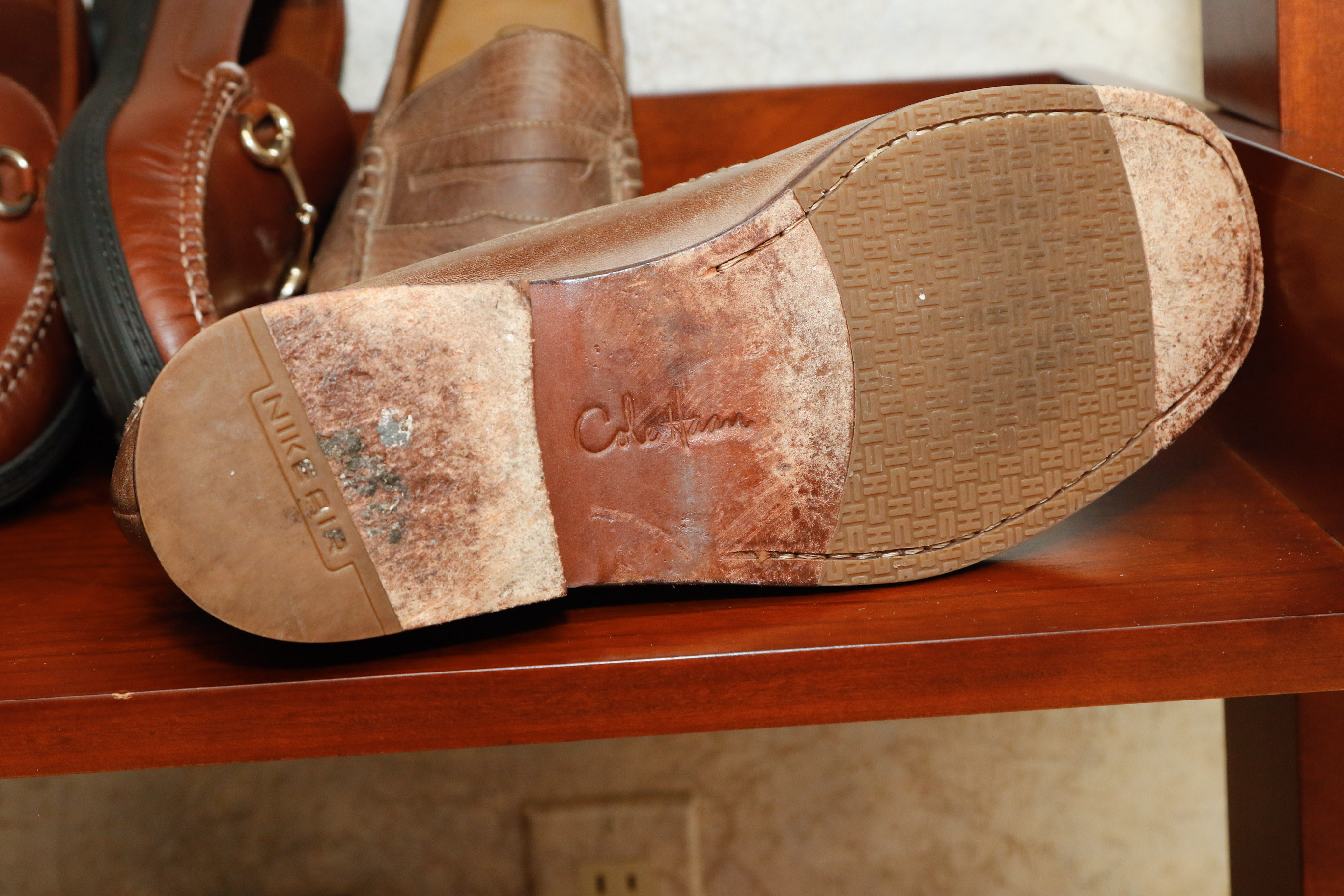 Four Pairs of Men's Loafers Including Coach and Cole Haan