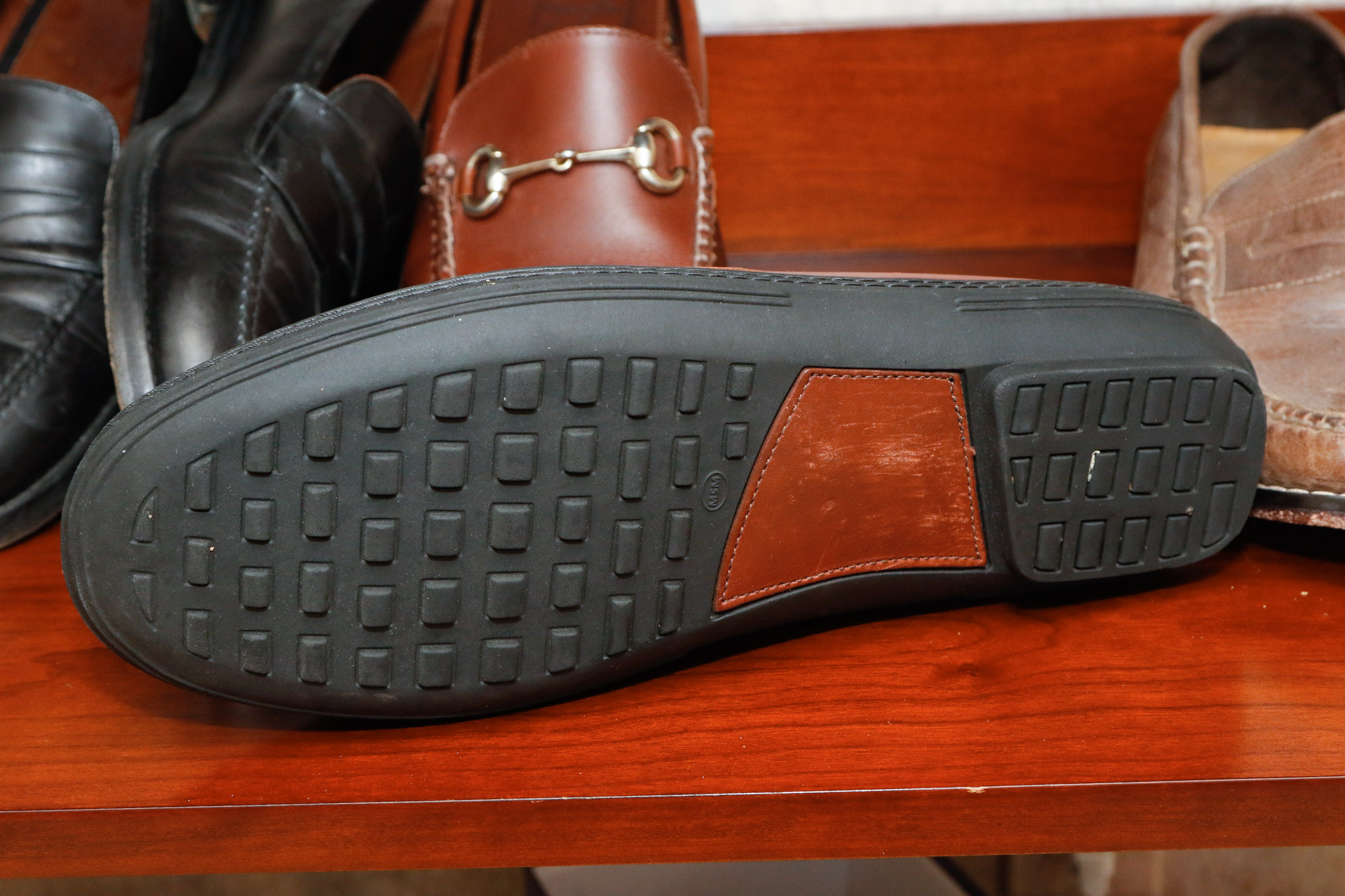 Four Pairs of Men's Loafers Including Coach and Cole Haan