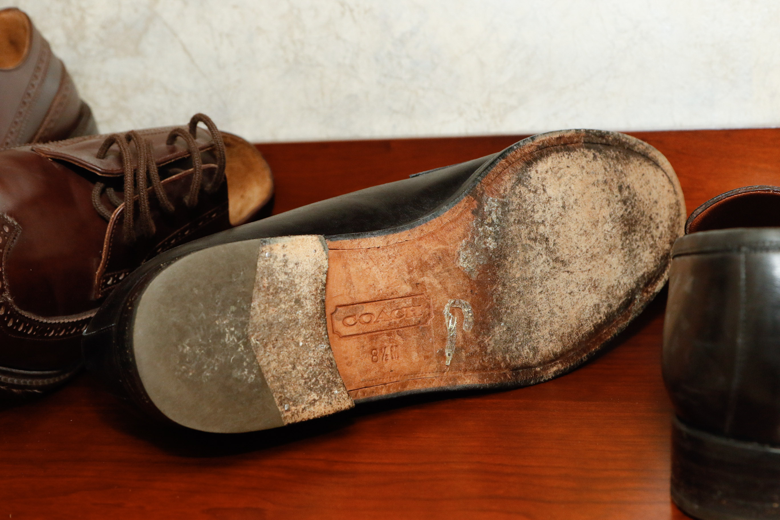 Four Pairs of Men's Loafers Including Coach and Cole Haan