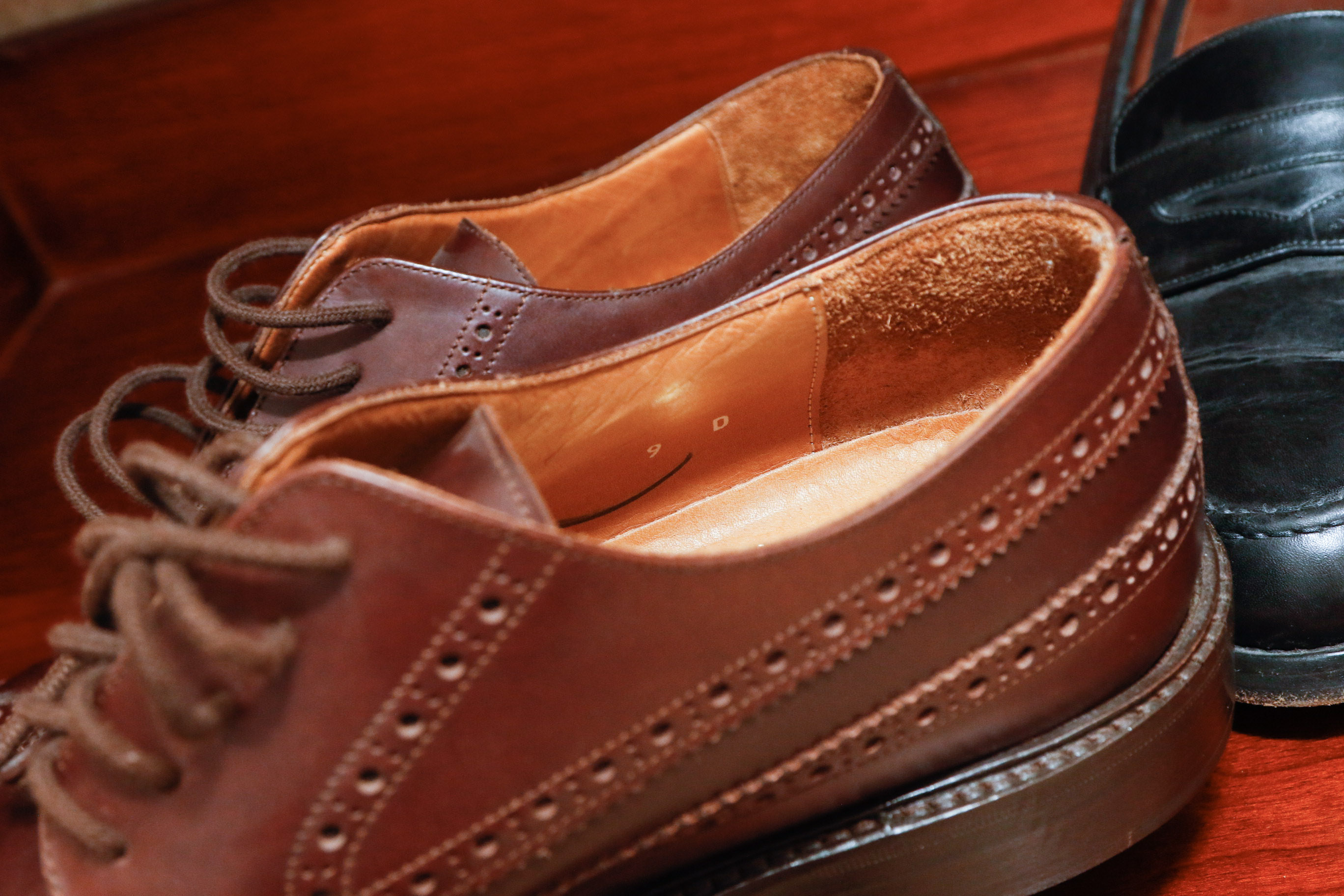 Four Pairs of Men's Loafers Including Coach and Cole Haan