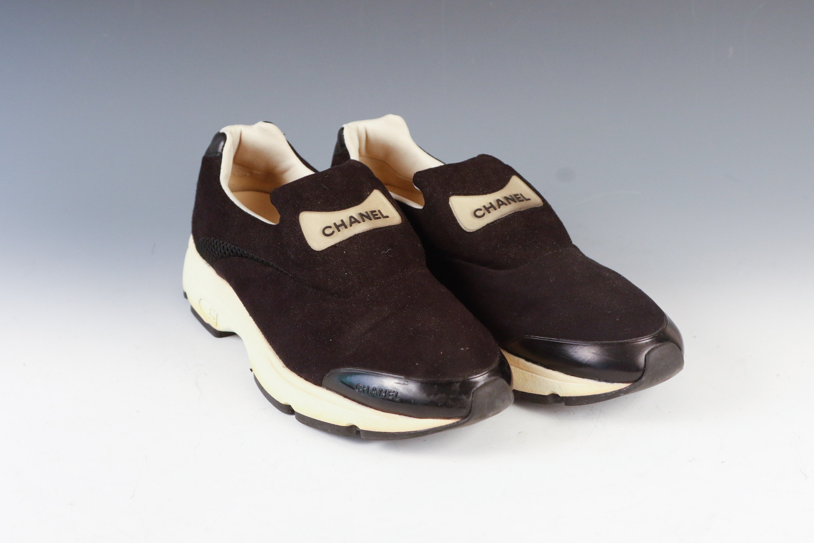 Women's Chanel Black Leather Slip-On Athletic Sneakers