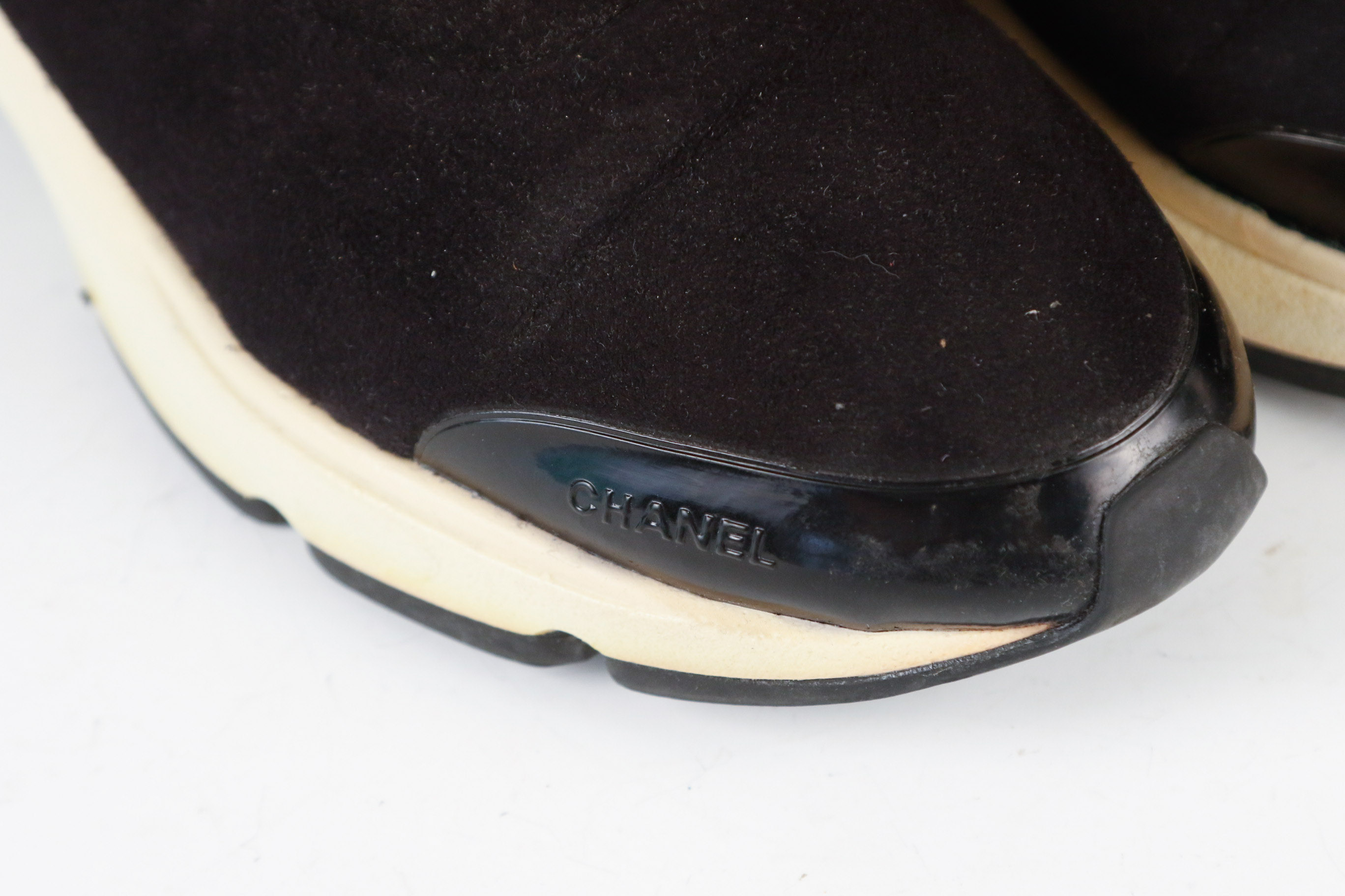 Women's Chanel Black Leather Slip-On Athletic Sneakers