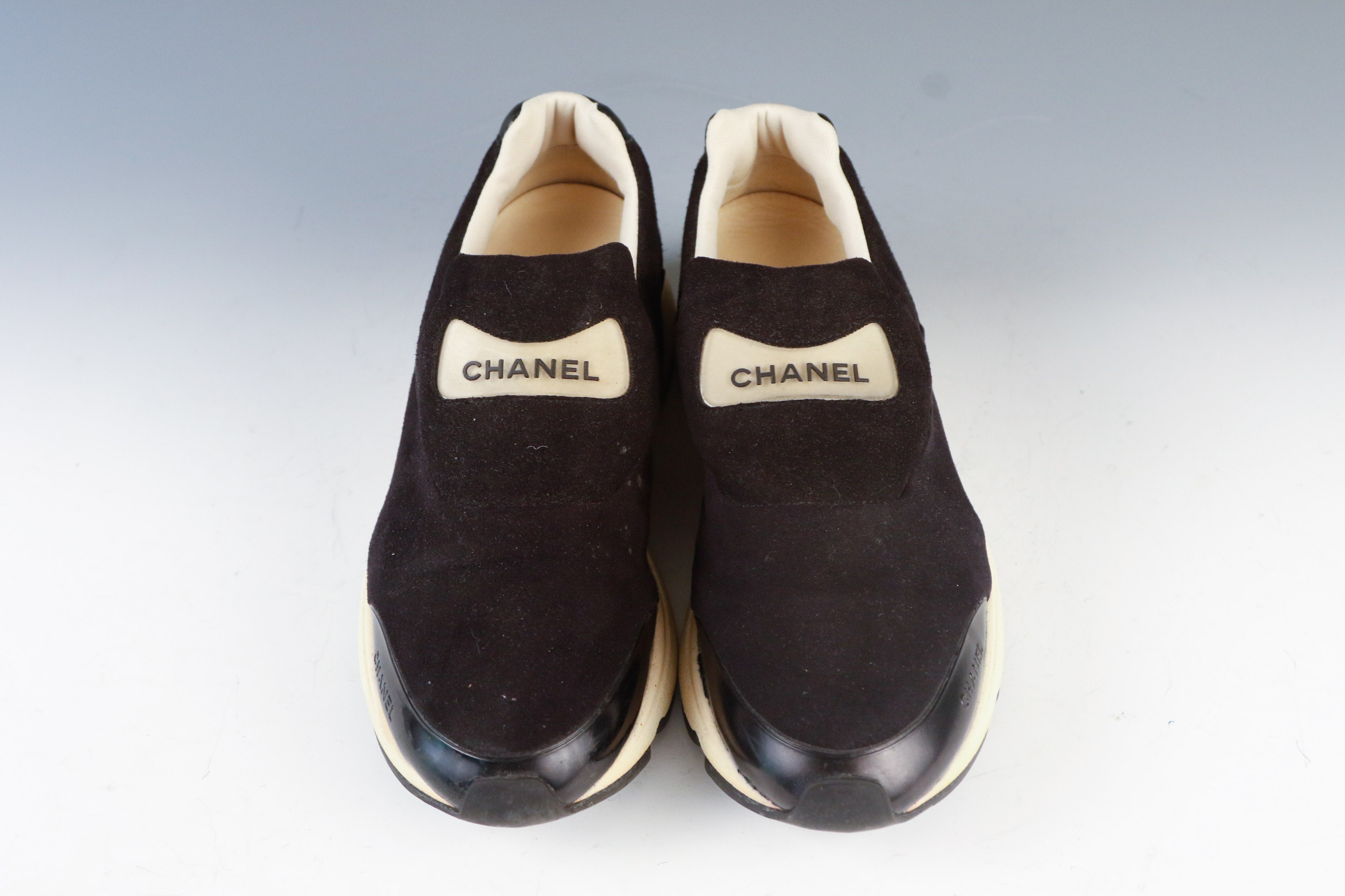 Women's Chanel Black Leather Slip-On Athletic Sneakers