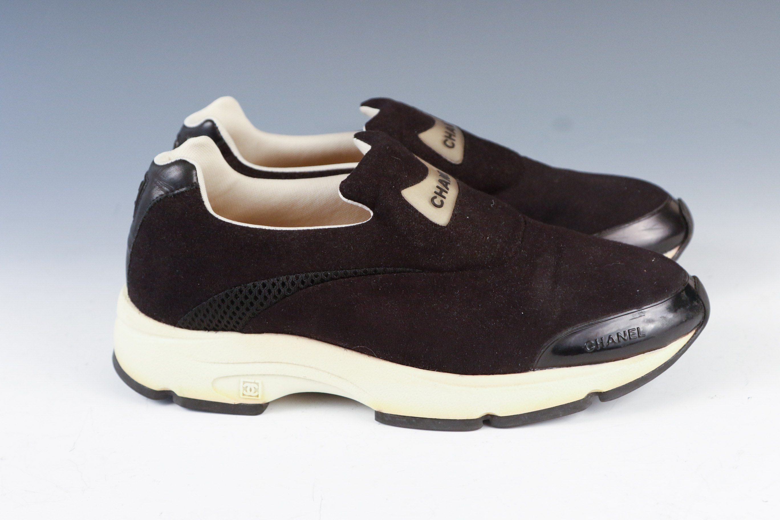 Women's Chanel Black Leather Slip-On Athletic Sneakers