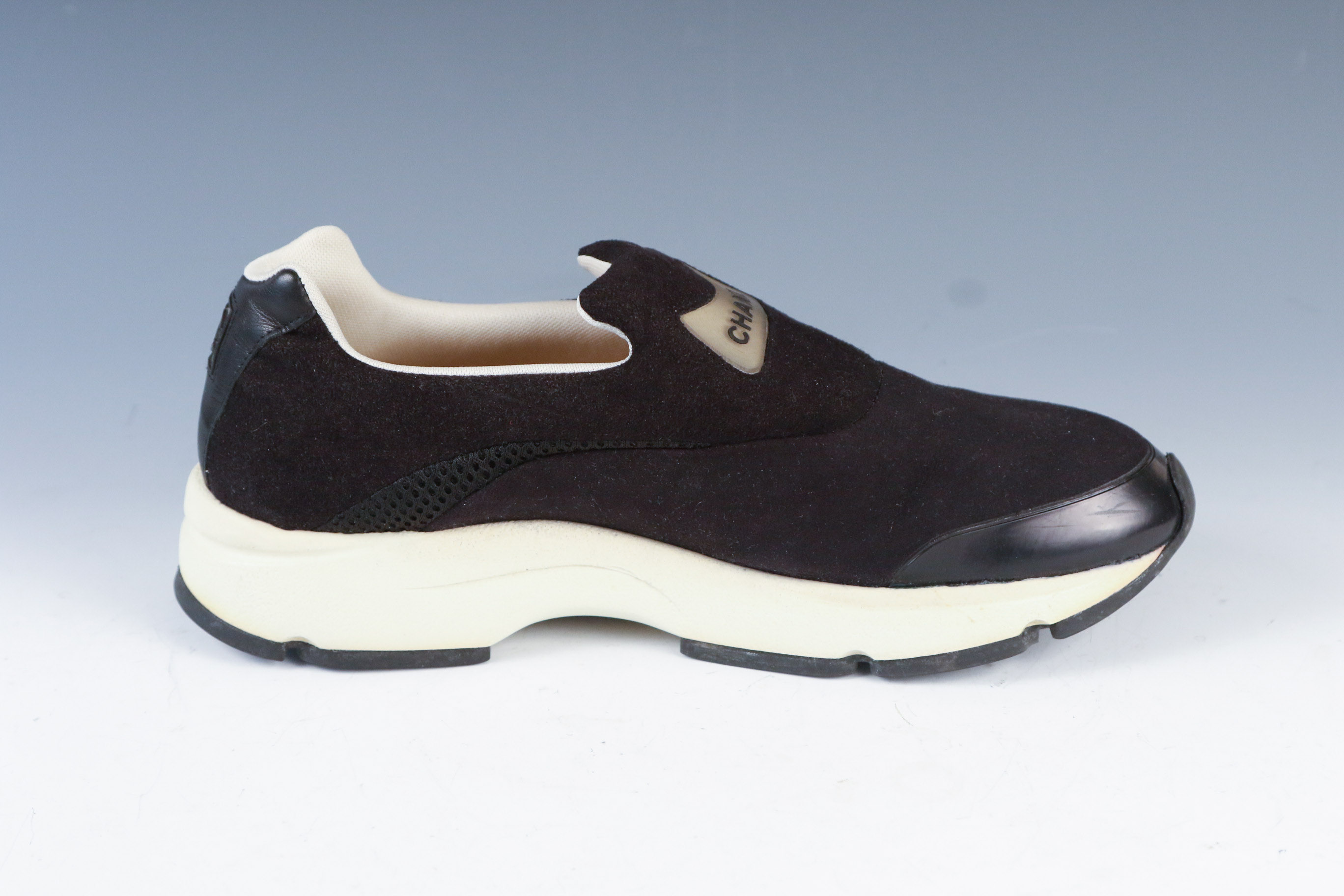 Women's Chanel Black Leather Slip-On Athletic Sneakers