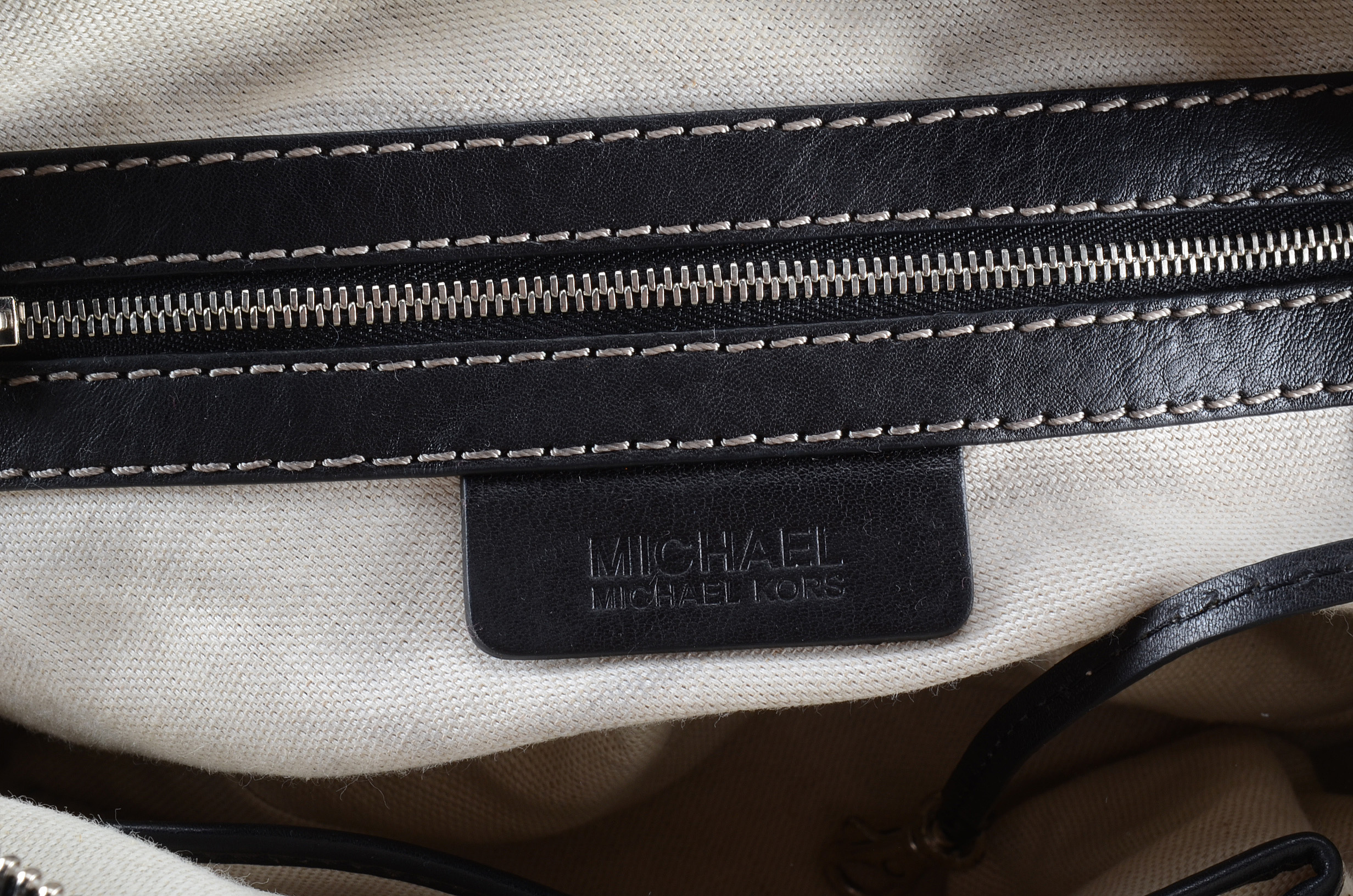 Two Leather Handbags Including Michael Kors