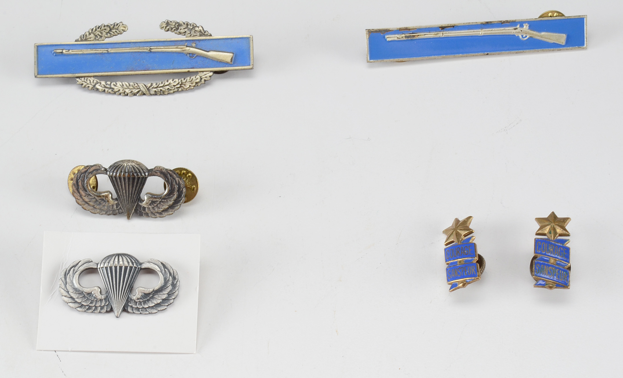Collection of WWII American Military Pins and Badges