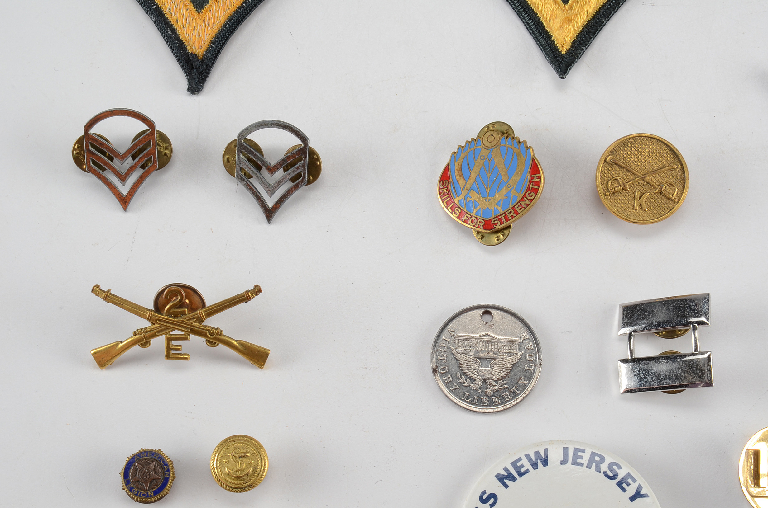 Collection of WWII American Military Badges, Pins, and Patches