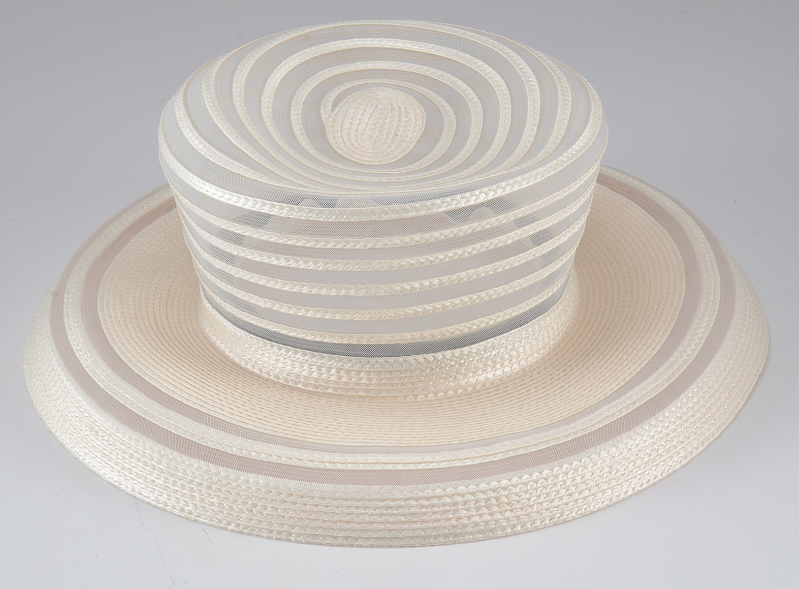 Three Women's Hats in Boxes