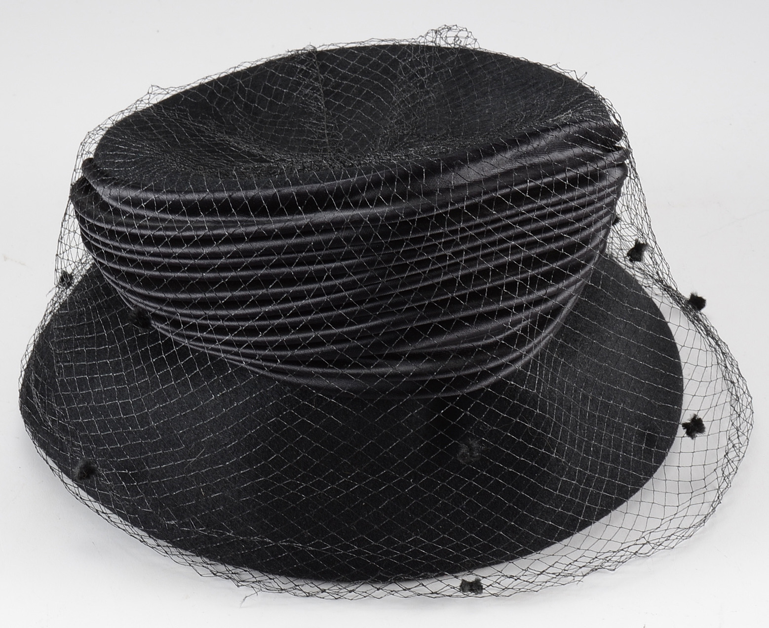 Three Women's Hats in Boxes