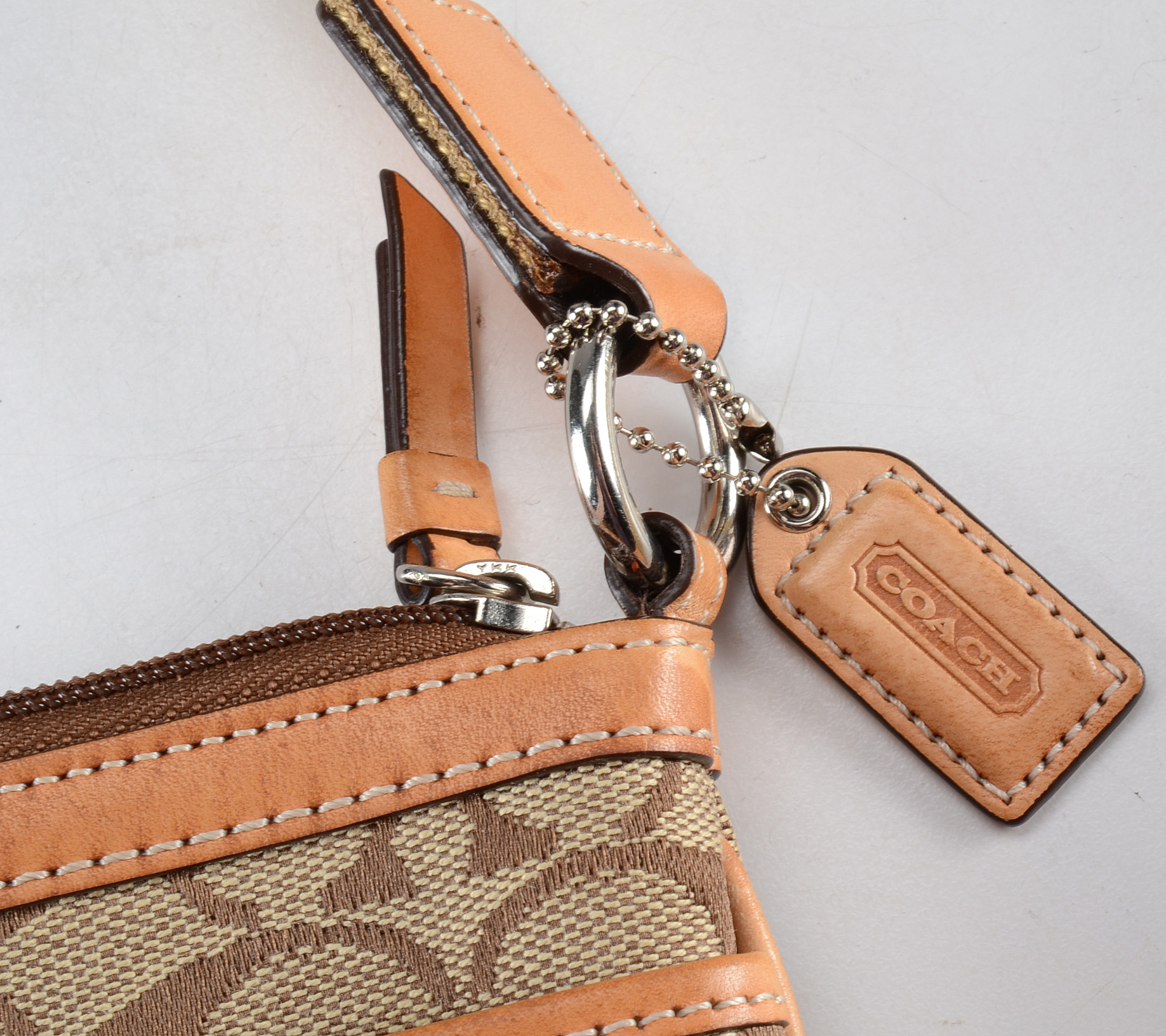 Three Coach Signature Handbags