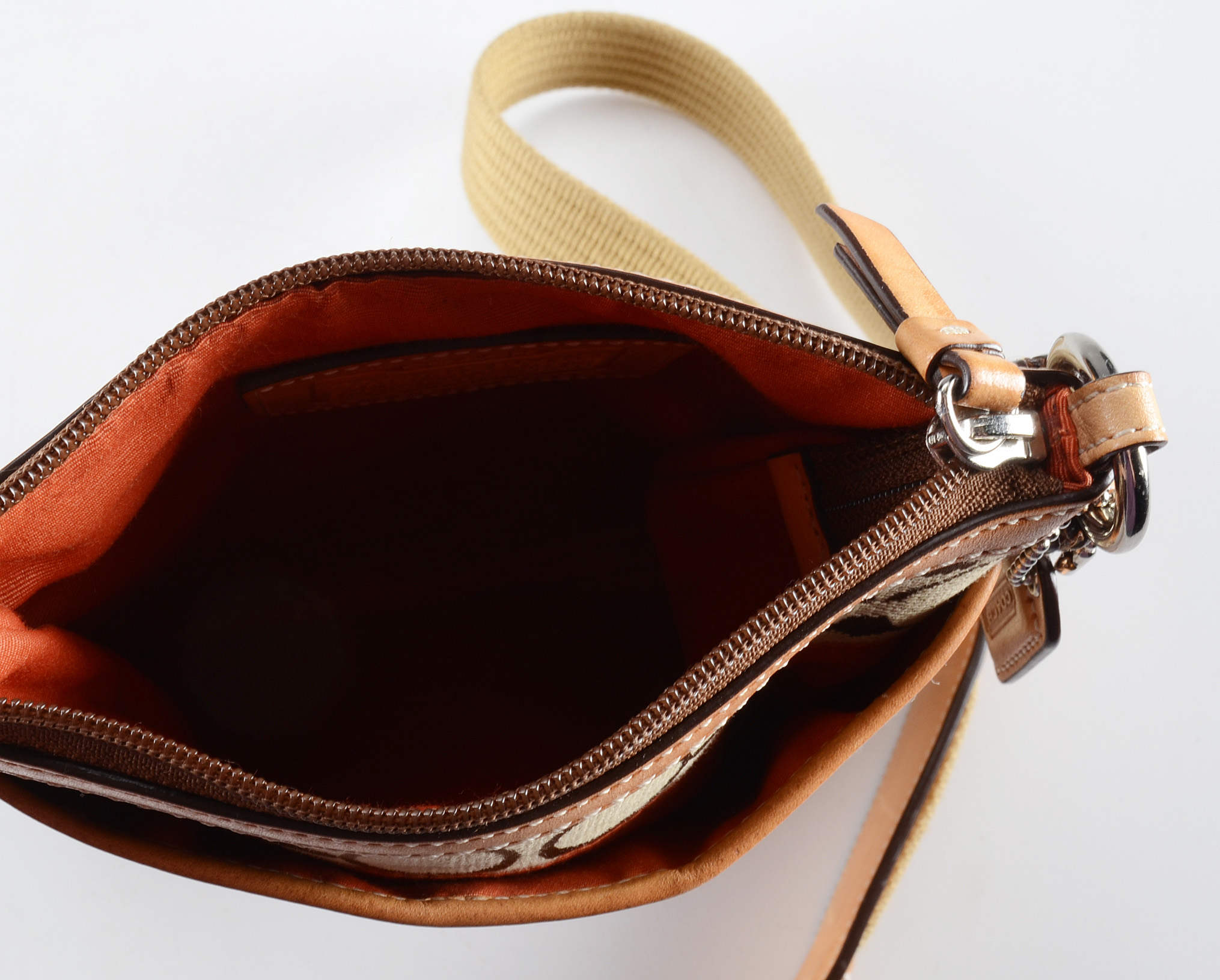 Three Coach Signature Handbags